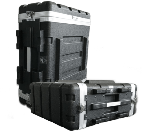 Two black hard plastic equipment cases with metal-reinforced edges, latches, and handles, one standing upright and the other lying flat against a black background. {{brizy_dc_image_alt imageSrc=